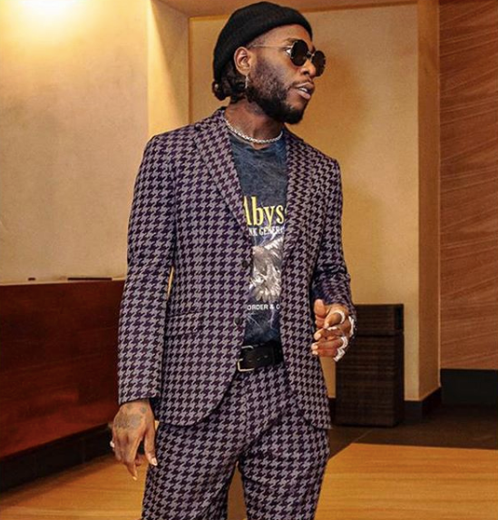 Burna Boy Kicks Fan at Show & Issues Apology Later